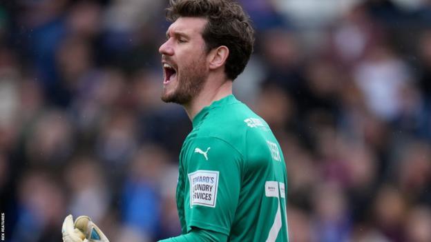 Peterborough keeper Jed Steer saved penalties from Promise Omochere and Bosun Lawal