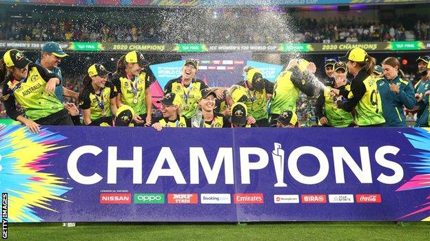 Australia celebrate with the Women's T20 World Cup trophy