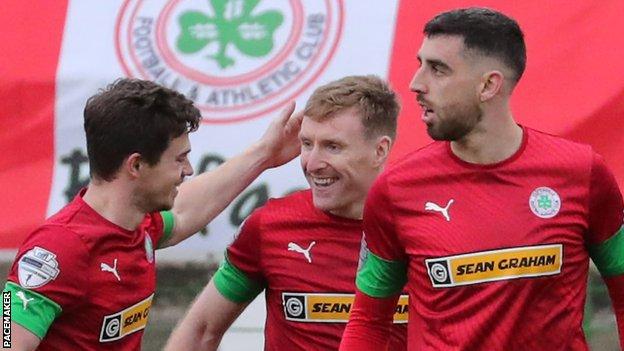 Chris Curran scored the opening goal as Cliftonville beat Glentoran at the Oval