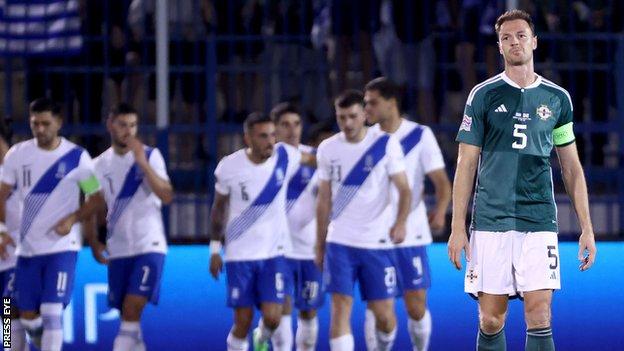 Northern Ireland's Jonny Evans looks dejected as Greece score in Athens