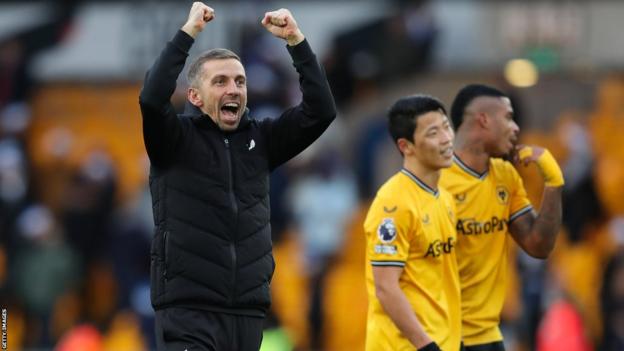 Gary O'Neil celebrating on the pitch after Wolves' win over Chelsea in December