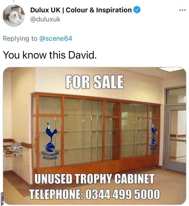 A since deleted tweet sent by the official Dulux account with a mocked-up advert for an unused trophy cabinet with the Spurs logo overlaid on the image