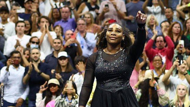 Serena Williams waves goodbye to the US Open crowd after losing to Ajla Tomljanovic