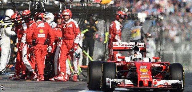 Ferrari's Sebastian Vettel leaves the pit lane