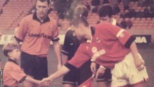 Kidderminster Harriers boss Russell Penn aged eight as a mascot at Wolves