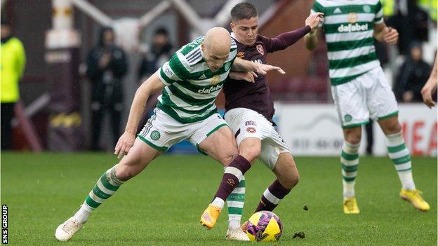 Aaron Mooy and Cammy Devlin