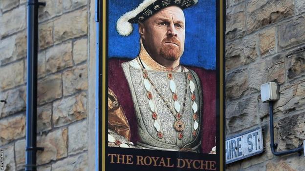 Sign for the Royal Dyche pub