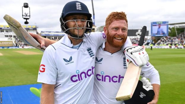 Joe Root (left) and Jonny Bairstow leave the pitch smiling after winning the Test v India at Edgbaston