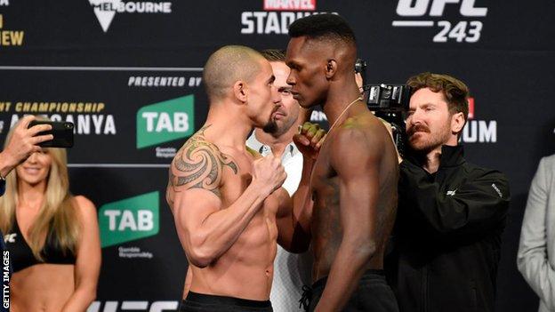 Robert Whittaker and Israel Adesanya