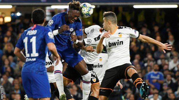 Tammy Abraham wins a header against Valencia