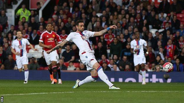 Damien Delaney scores an own goal against Manchester United