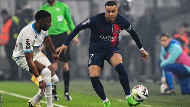 Paris St-Germain striker Kylian Mbappe in action against Marseille