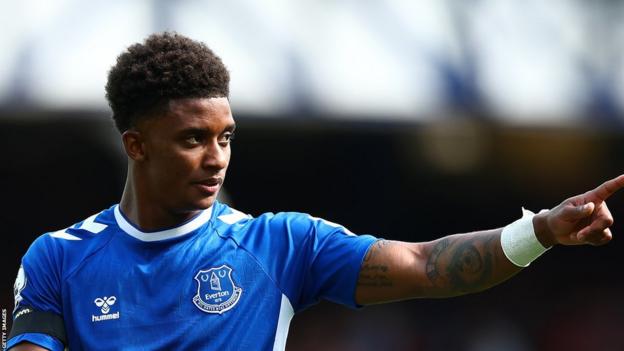 Demarai Gray points while playing for Everton