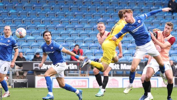 Chesterfield's Tom Naylor scores against Portsmouth