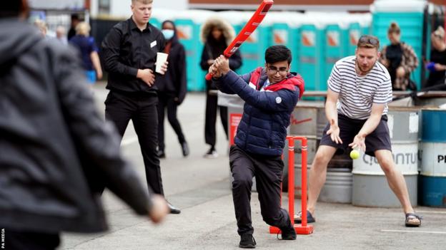 Fans play cricket at Emirates Old Trafford