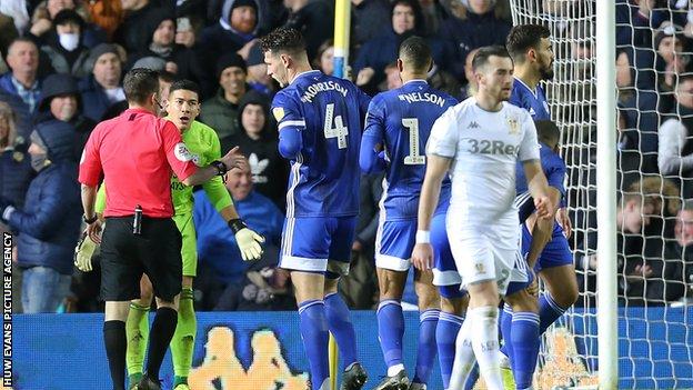Cardiff City players react to Sean Morrison's red card at Leeds