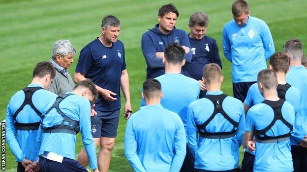 Dynamo Kyiv players have a discussion with their manager