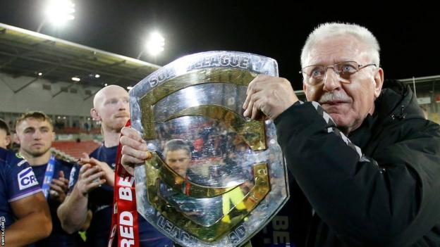 Wigan Warriors chairman Ian Lenagan holds the League Leaders' Shield