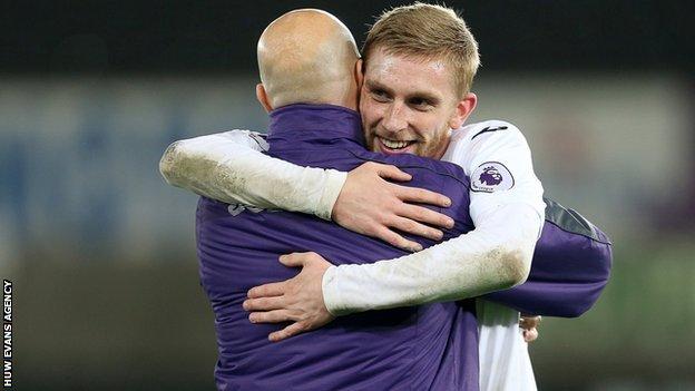 Cameron Toshack hugs goal scorer Oliver McBurnie after their 2-1 win over Wolves in the EFL Trophy