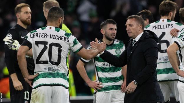 Brendan Rodgers with his players at full-time after the 2-2 home draw with Atletico