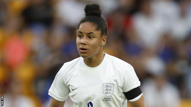 Demi Stokes playing for England against Belgium