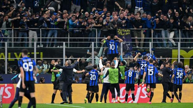 Lautaro Martinez celebrates with Inter fans