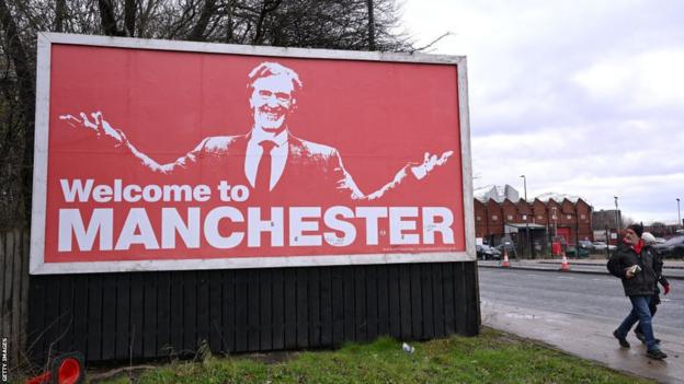 A billboard welcoming Sir Jim Ratcliffe to Manchester has been put up near Old Trafford