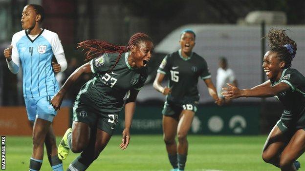 Christy Ucheibe celebrates her goal for Nigeria