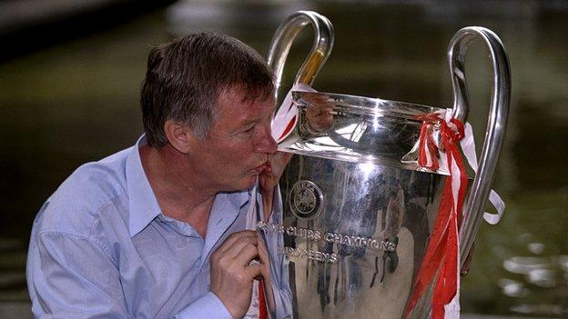 Sir Alex Ferguson with the Champions League trophy