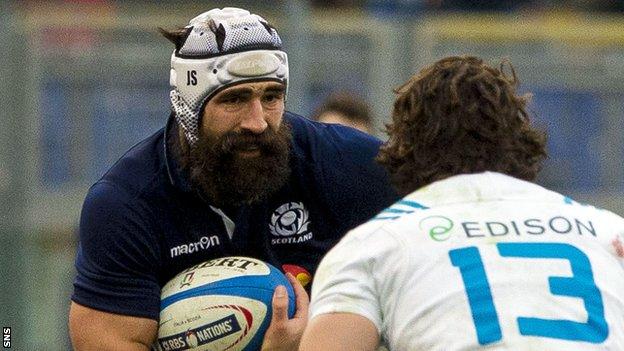 Josh Strauss takes on the Italy defence for Scotland