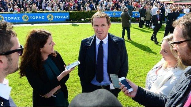 Jockey AP McCoy answering questions from reporters at Galway