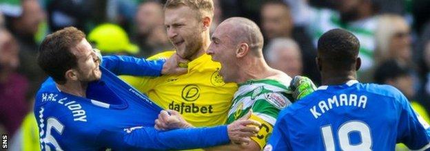 Andy Halliday and Scott Brown tussle