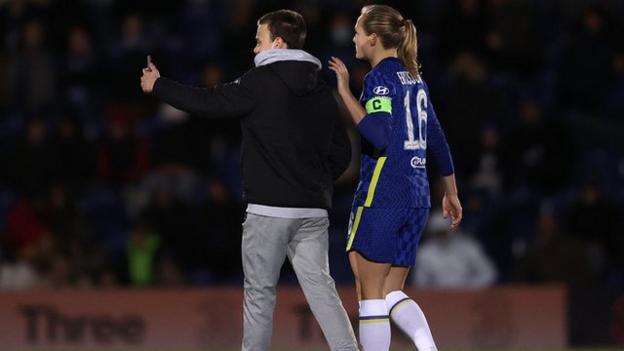 Pitch invader with Chelsea captain Magdalena Eriksson