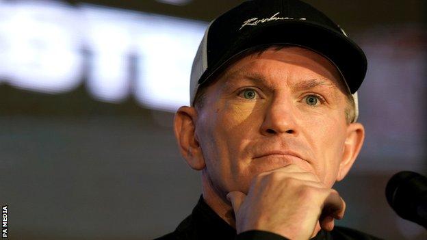Ricky Hatton listens to a questions at a news conference