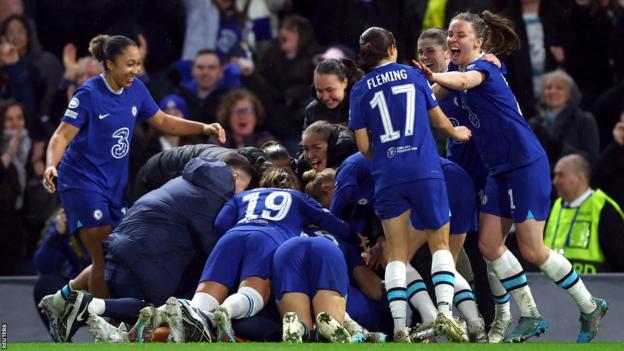 Chelsea's players celebrate winning the penalty shootout v Lyon at Stamford Bridge