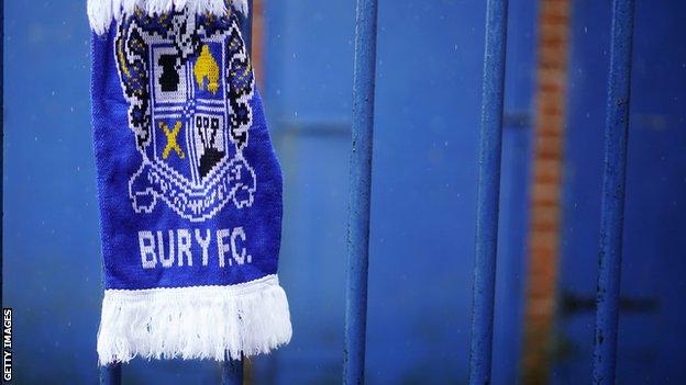 Bury scarf tied to the fence