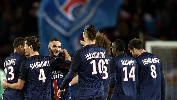 Paris St-Germain's players celebrate scoring against Troyes