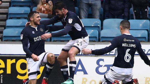 Lee Gregory celebrates on one knee after scoring against Nottingham Forest