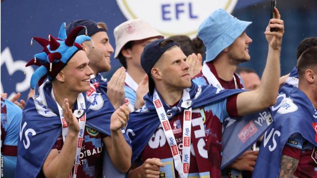 Burnley celebrate promotion from the Championship