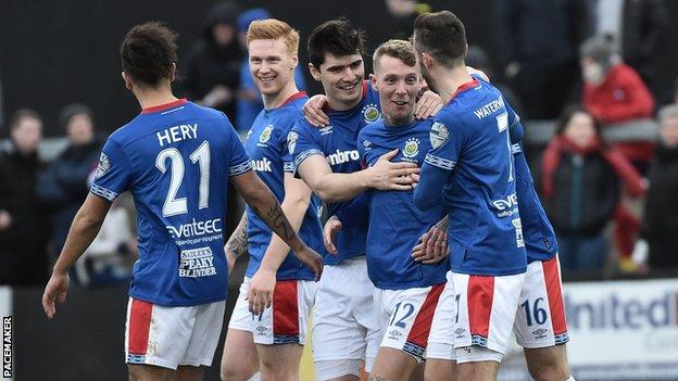 Linfield celebrate Kirk Millar's free-kick