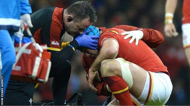 Justin Tipuric is treated before departing against Italy