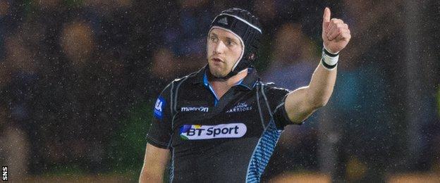 Glasgow fly-half Finn Russell gives a thumbs-up to team-mates against Ulster