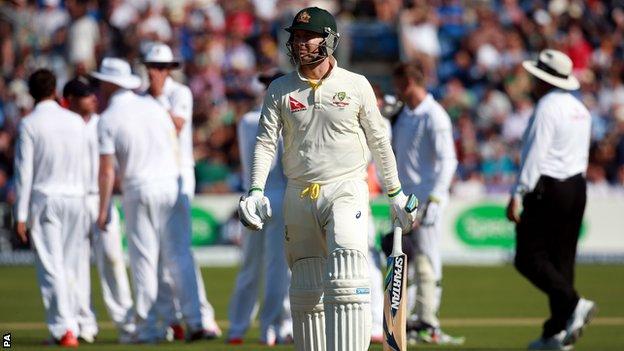 Michael Clarke walks off after being dismissed by Moeen Ali