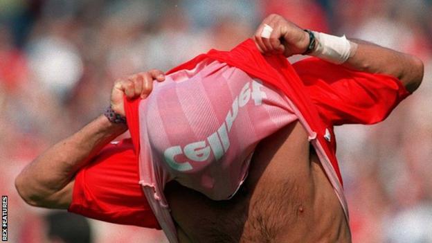 Fabrizio Ravanelli celebrates scoring against Liverpool by lifting his shirt above his head
