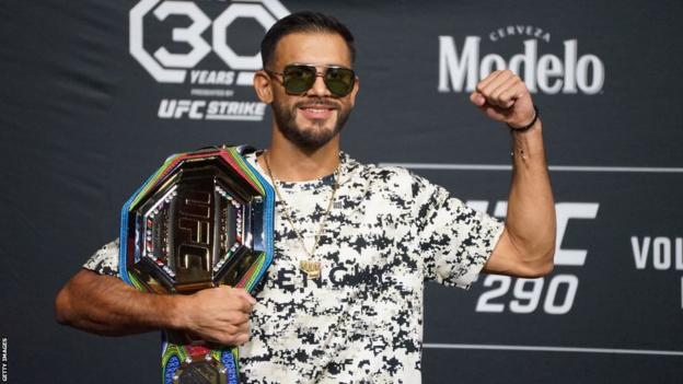 Yair Rodriguez with a customised UFC title