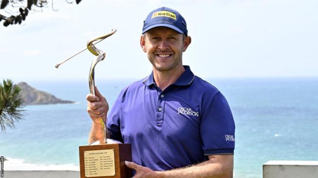 Stuart Manley lifts the Open de Bretagne trophy