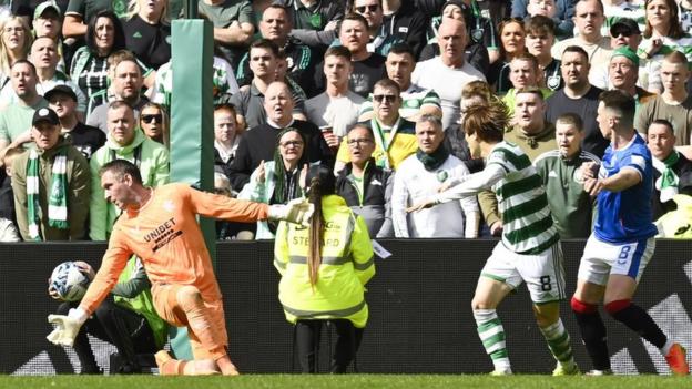Kyogo Furuhashi seized on a Ben Davies mistake to net his second goal and restore Celtic's lead