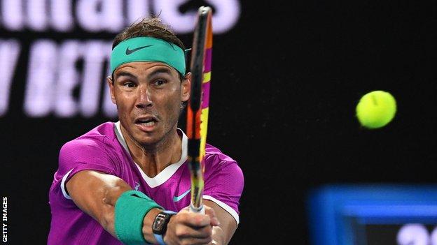 Rafael Nadal returns a ball against Matteo Berrettini in their 2022 Australian Open semi-final