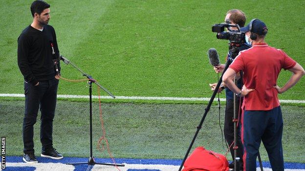 Mikel Arteta is interviewed before a game