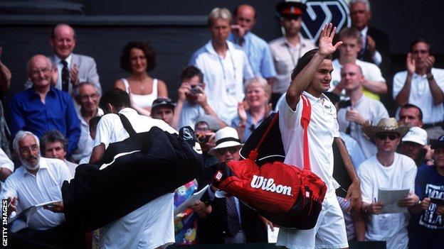 Sampras leaves the court as Federer celebrates